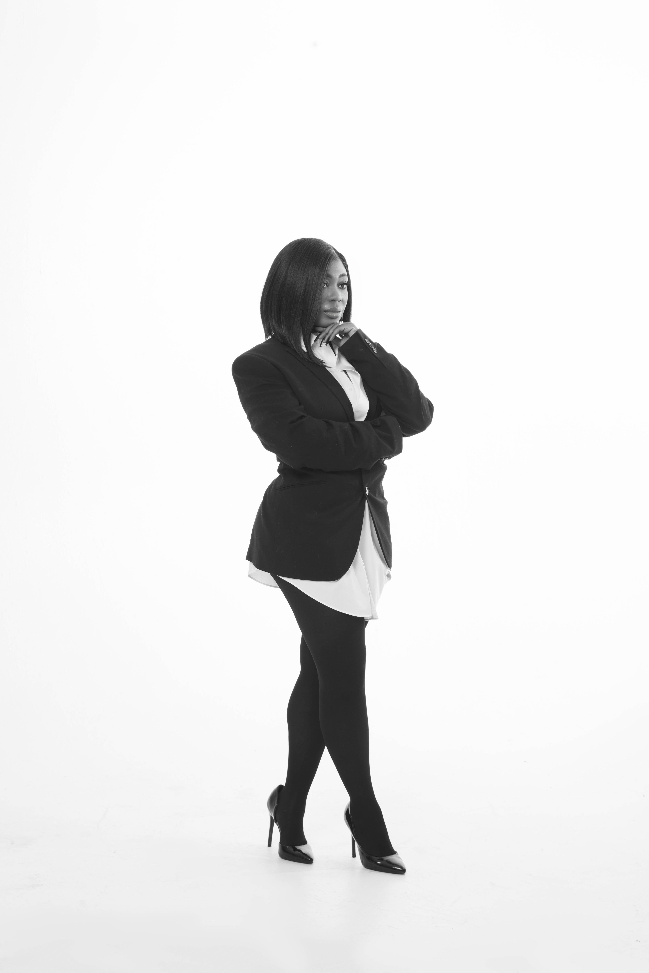 Black-and-white full-length portrait of Christlie Jean-Baptiste